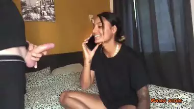 indian slut is on the phone with her boyfriend while cheating on him