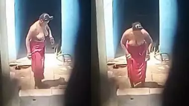Big boobs village bhabhi topless bathing caught by hidden cam