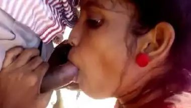 Desi village girl sucking lover cock outdoor