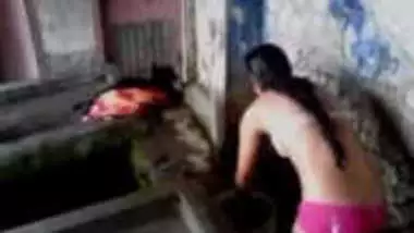 Woman washes her sex body wearing only XXX bra and panties on camera