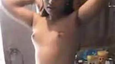 Joyful Desi girl shakes small XXX tits while dancing completely naked