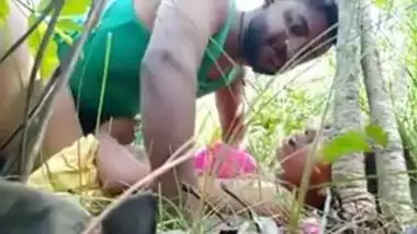Young couple lovers enjoying sexy outdoor fun in the rice field