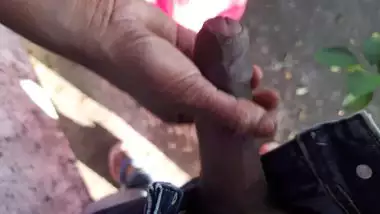 Desi chick strokes boyfriend's XXX tool with mouth and pussy outdoors