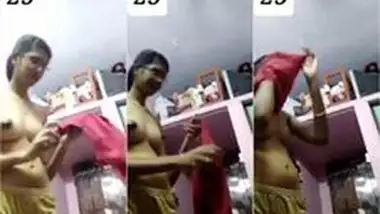 Slim south Indian girl changing dress on video call