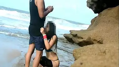 Indian slut sucks her husband?s dick on the beach
