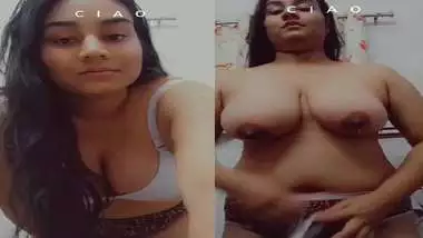 Tanker girlfriend stripping bra and showing big boobs