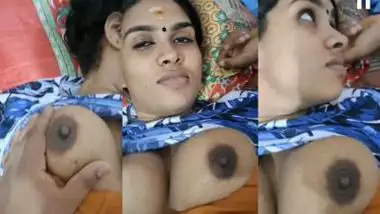 Squeezing a Tamil milf?s milky boobs